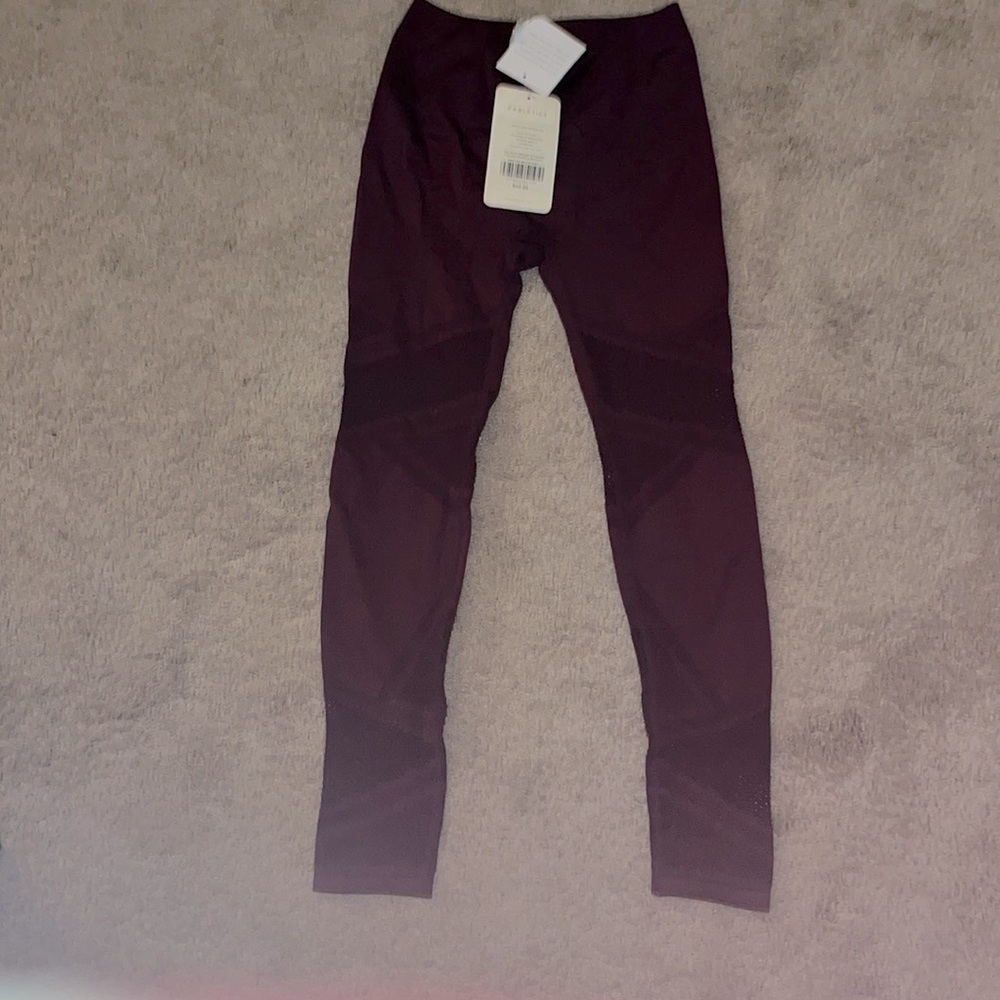 NWT ex small Fabletics! Color is plum purple